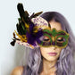 Multi Ornate masquerade mask with layered feather accents and elegant detailing for a dramatic, eye-catching look. Designed for comfortable wear at masquerade balls, costume parties, festivals, theatrical performances, parades, and themed events. A bold accessory that adds mystery, glamour, and statement style.