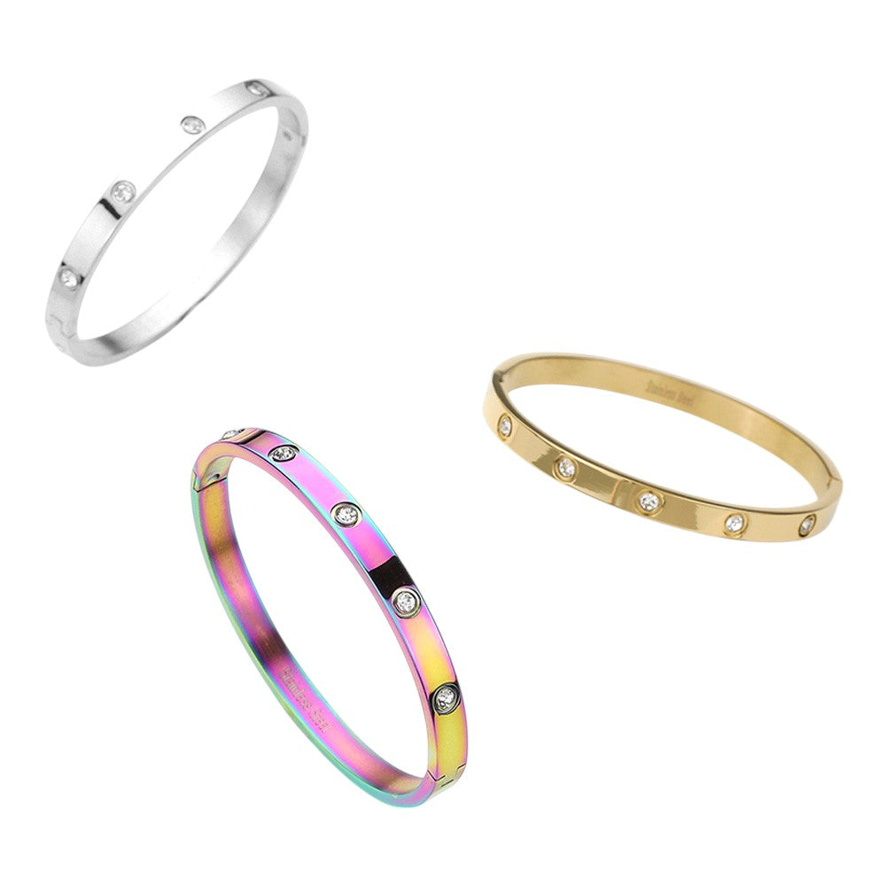 Multi Stainless Steel Crystal Embellished Bangle Evening Bracelet is the perfect accessory for any formal occasion. Made with high-quality stainless steel and adorned with sparkling crystals, it exudes sophistication and glamour. Elevate your evening look with this stunning bracelet.