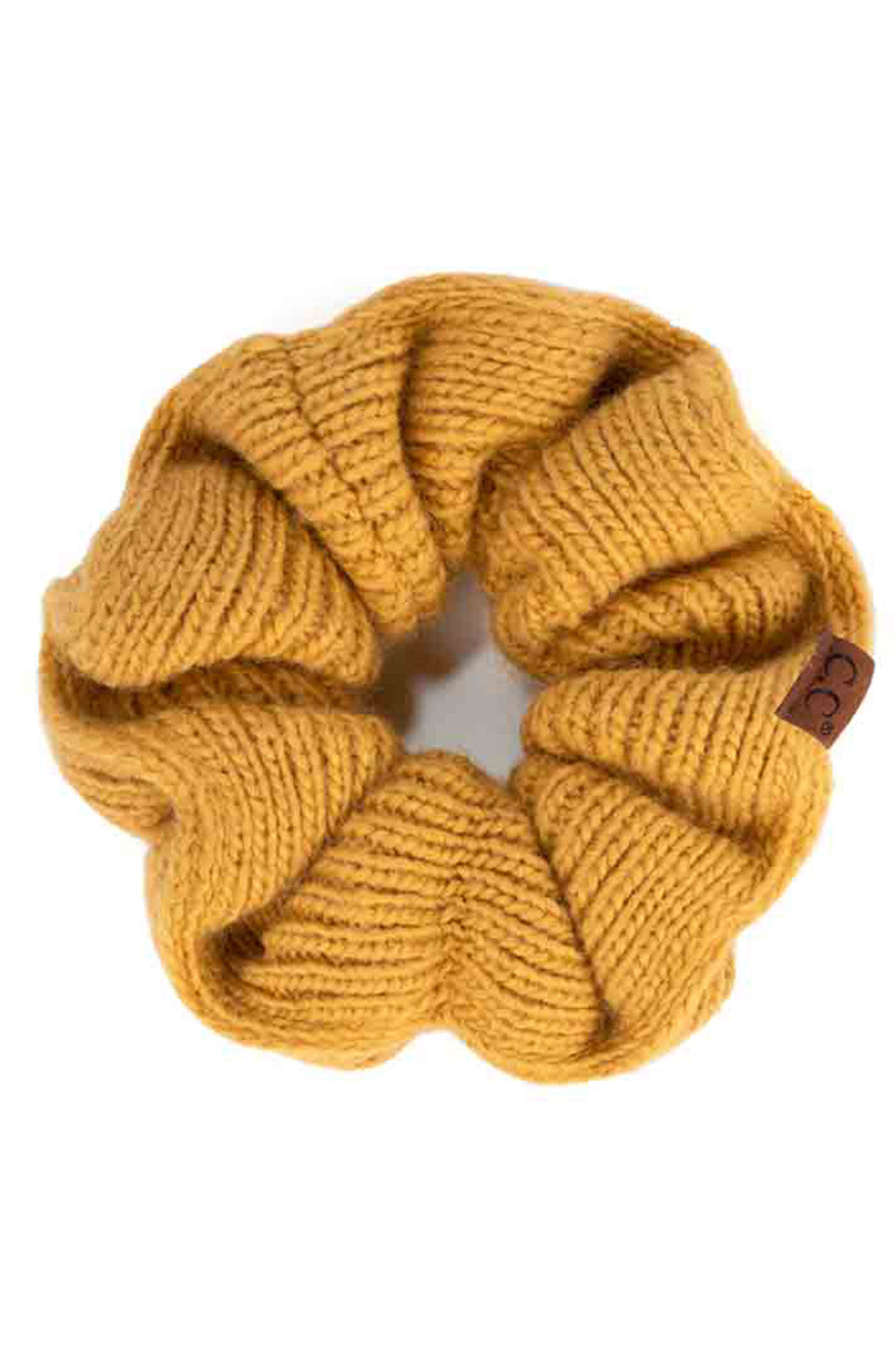 Mustard  C.C. Soft Knit Scrunchies provide a stylish and comfortable way to keep your hair in place without causing damage. Made with soft knit material, they are gentle on your hair and perfect for everyday wear. Their scrunchy design also adds a trendy touch to your hairstyle