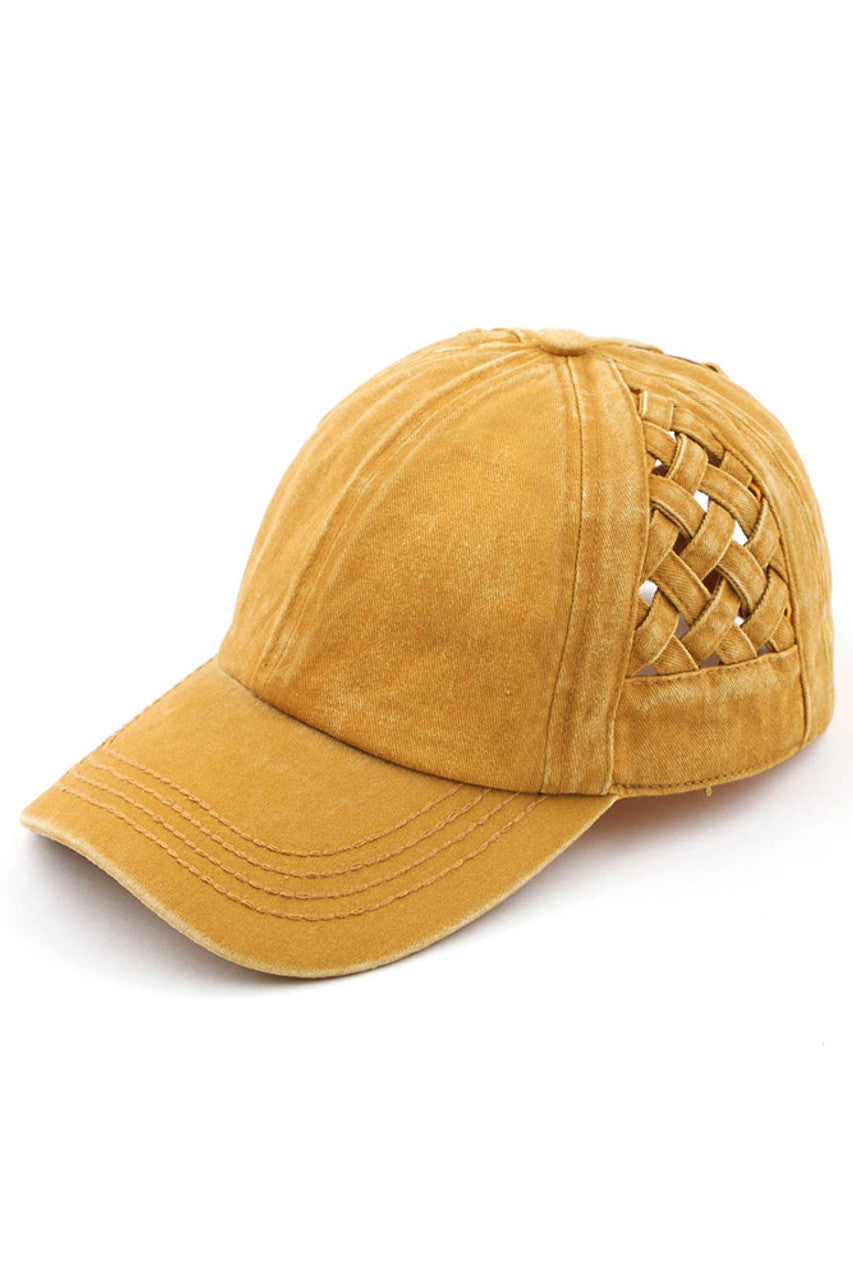 Mustard C.C WEAVON BASKET CRISS-CROSS PONYCAP is a stylish and functional accessory for any outfit. Made with high-quality materials, this cap features a unique criss-cross design, providing both style and comfort. Stay protected from the sun while looking your best with this trendy ponycap.