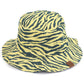 Mustard C.C. ZEBRA PRINT BUCKET HAT is the perfect accessory for any outdoor adventure. Made from high-quality materials, it offers both style and functionality. Stay protected from the sun and make a statement with its bold zebra print design. Trust in C.C. for expertly crafted hats.