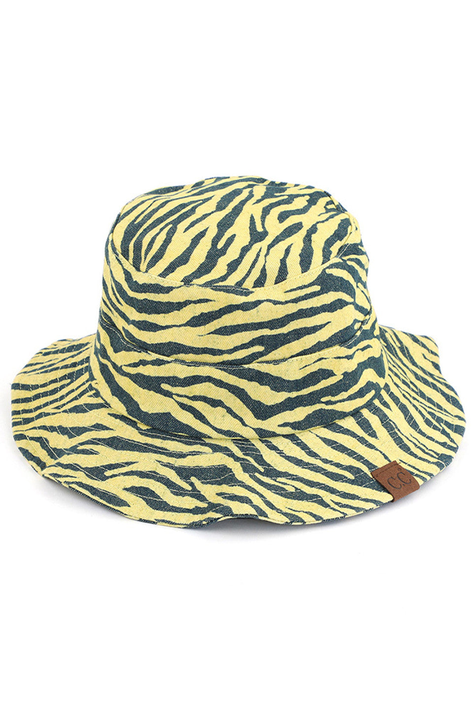 Mustard C.C. ZEBRA PRINT BUCKET HAT is the perfect accessory for any outdoor adventure. Made from high-quality materials, it offers both style and functionality. Stay protected from the sun and make a statement with its bold zebra print design. Trust in C.C. for expertly crafted hats.