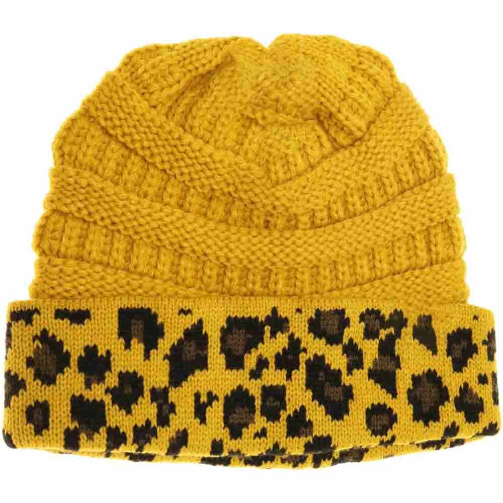 Mustard Matching Cuff Leopard Print CC Beanie combines expert craftsmanship with standout style. Designed with a comfortable cuff and eye-catching leopard pattern, this beanie offers reliable warmth and a fashionable look. Its stretchy fabric ensures a secure fit for extended wear, making it an ideal accessory for cool weather while enhancing your seasonal wardrobe with a touch of wild sophistication. 