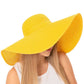 Mustard Solid Floppy Straw Sun Hat, Stay stylish and protected from the sun with our sun hats! Made from high-quality straw, this hat is perfect for any sunny day. Its floppy design not only looks fashionable but also provides ample shade for your face and neck. Don't forget to pack this accessory for your next beach trip!