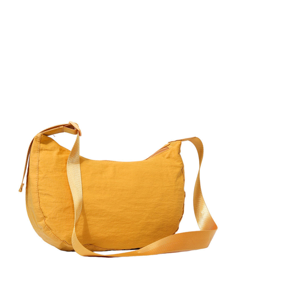 Mustard Solid Nylon Sling Bag Crossbody Bag, is perfect to carry all your handy items with ease. This handbag features a top zipper closure for security that makes your life easier and trendier. This is the perfect gift idea for a birthday, holiday, Christmas, anniversary, Valentine's Day, etc.
