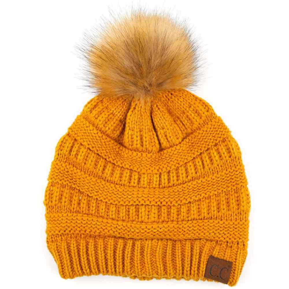 Mustard Stay warm and cozy with this classic C.C Pom Pom Knit Beanie, crafted from 100% soft acrylic for all-day comfort. The ribbed knit design adds texture and durability, while the signature pom pom on top brings a playful touch to any winter outfit. One size fits most, making it the perfect accessory for everyone. Ideal for cold weather adventures or casual everyday wear.