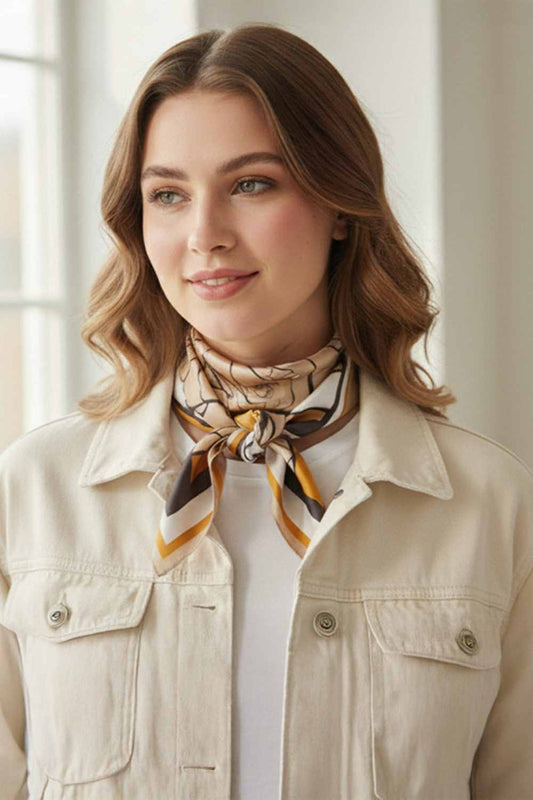 Mustard Elevate your accessory game with this Modern Rose Print Bandana Scarf. Crafted from 100% lightweight polyester, this versatile 27.5" x 27.5" square scarf features a contemporary rose print that transitions seamlessly across seasons. The silky fabric drapes beautifully whether worn as a headscarf, neck wrap, or styled into your hair. Perfect for adding a touch of elegance to any outfit while keeping you comfortable year-round.