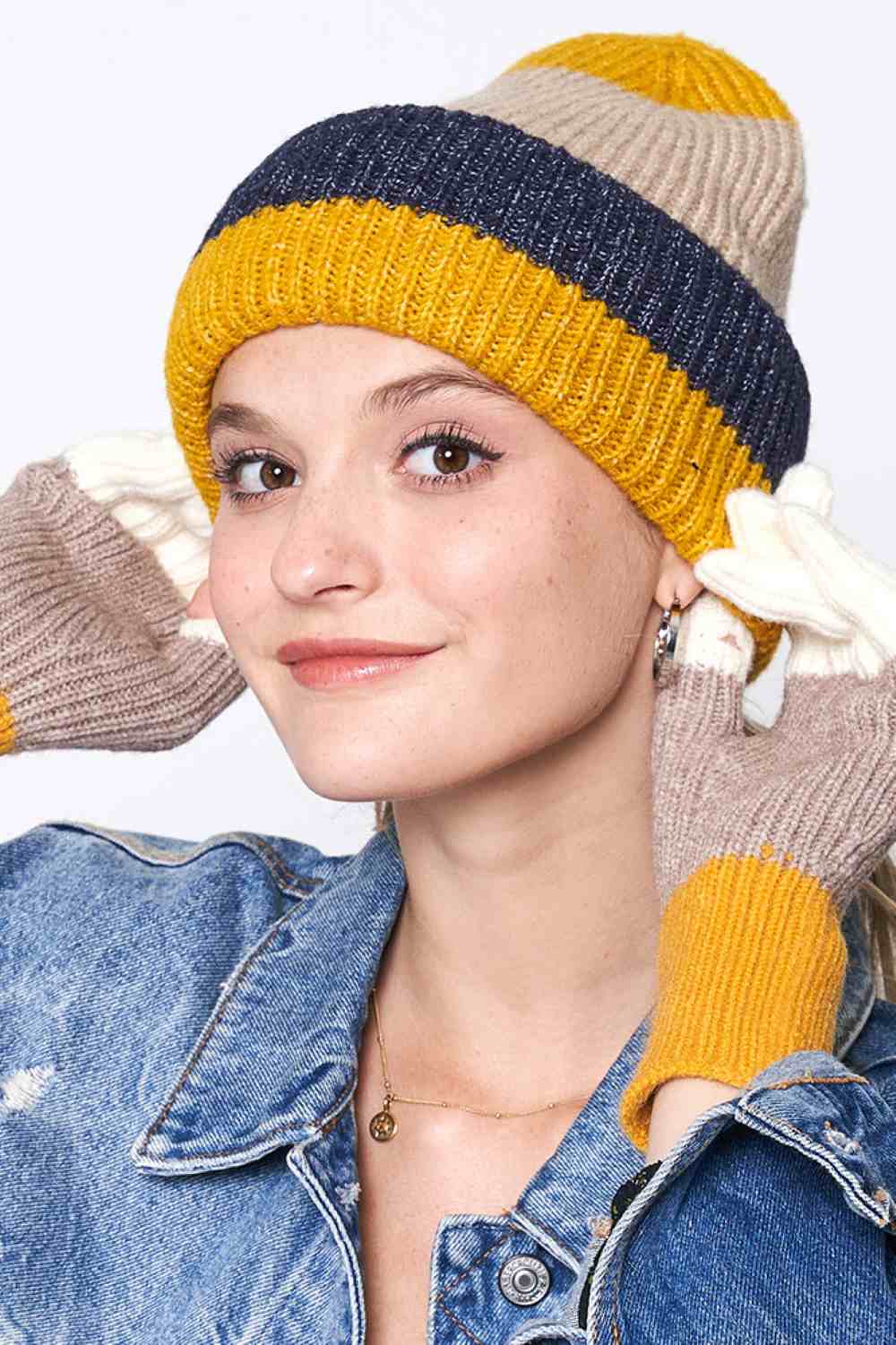 Mustard Stripe Color Block Ribbed Beanie features bold striped color-block detailing with a ribbed knit texture for a modern, sporty winter look. Designed with a soft stretch fit, it delivers cozy warmth and everyday comfort while adding standout style to your cold-weather outfits.