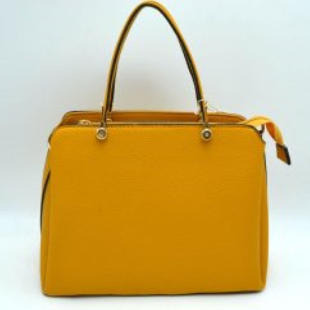Mustard yellow This structured handbag is designed for everyday use, featuring dual arched top handles attached with round metallic hardware. The design includes multiple storage compartments to organize your belongings, featuring a central zippered closure alongside separate side compartments.