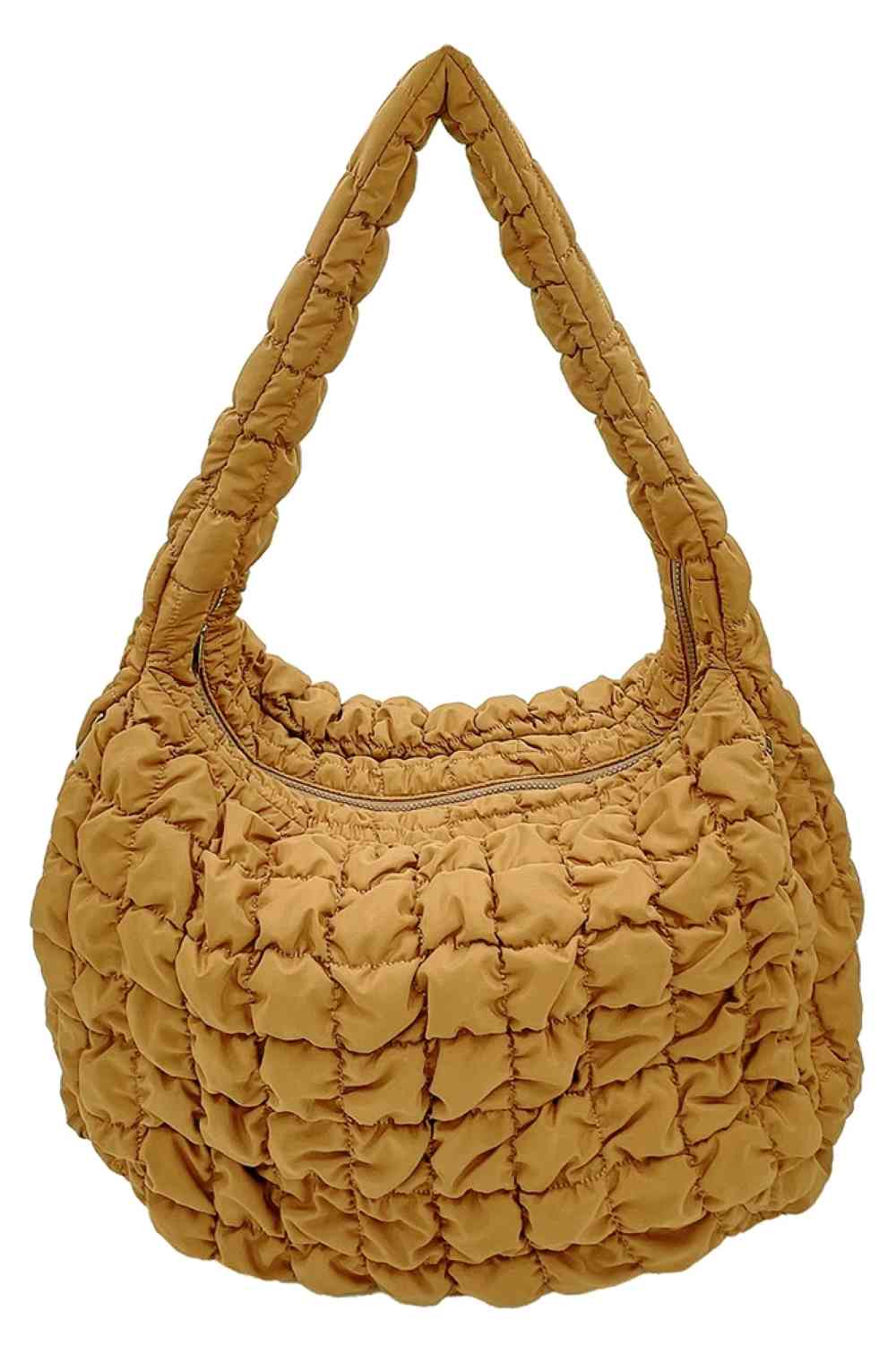 Mustard Carry your essentials in style with this Large Quilted Solid Bag. Crafted from durable 100% polyester with a classic quilted design, it offers a sleek, versatile look that complements any outfit. The adjustable sling strap allows for comfortable crossbody wear, making it perfect for everyday errands, travel, or casual outings.