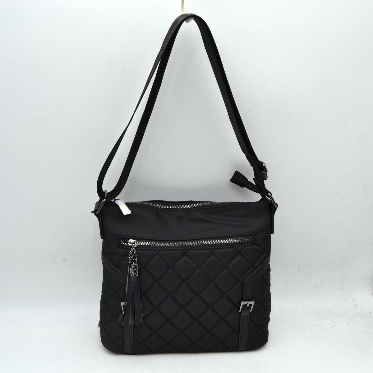 Quilted Nylon Crossbody Bag with Buckle Accents and Tassel Charm - Black - Crossbody Bags