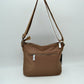Quilted Nylon Crossbody Bag with Buckle Accents and Tassel Charm - Crossbody Bags