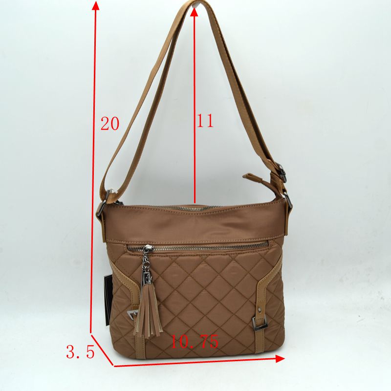 Quilted Nylon Crossbody Bag with Buckle Accents and Tassel Charm - Crossbody Bags
