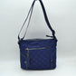 Quilted Nylon Crossbody Bag with Buckle Accents and Tassel Charm - Navy Blue - Crossbody Bags