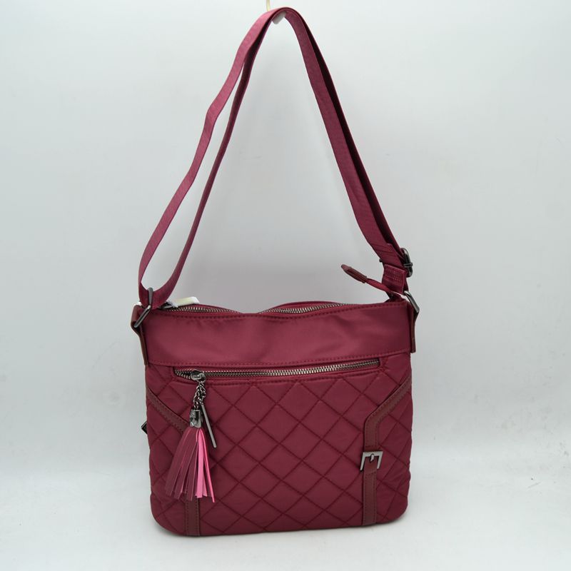 Quilted Nylon Crossbody Bag with Buckle Accents and Tassel Charm - Wine - Crossbody Bags