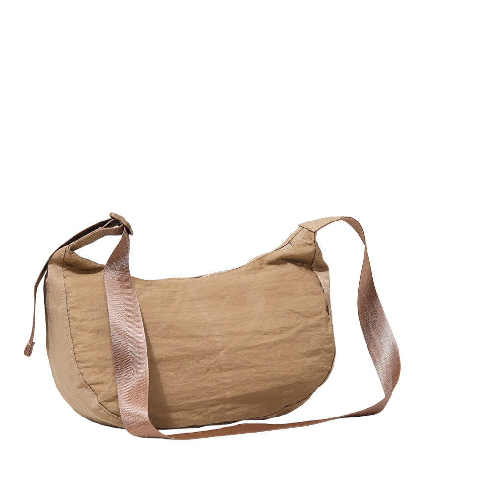 Natural Solid Nylon Sling Bag Crossbody Bag, is perfect to carry all your handy items with ease. This handbag features a top zipper closure for security that makes your life easier and trendier. This is the perfect gift idea for a birthday, holiday, Christmas, anniversary, Valentine's Day, etc.