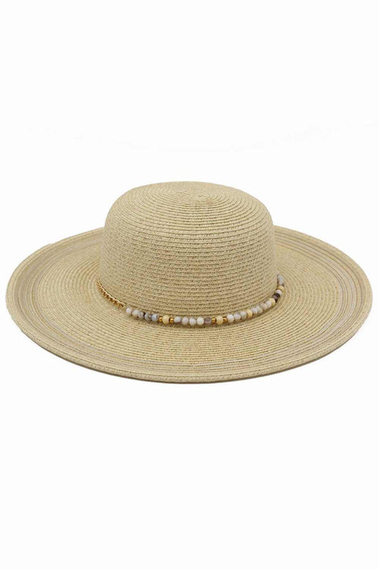 Natural Protect yourself in style with this charming summer straw sun hat, featuring a striking turquoise stone-beaded band. Crafted from a breathable blend of 80% paper and 20% polyester, it offers lightweight comfort for all-day wear. The UPF 50+ UV protection shields your face and neck from harmful sun rays, making it perfect for beach days, outdoor events, and sunny adventures. Whether you're lounging poolside or exploring a new destination, this versatile hat combines practical sun protection with effo