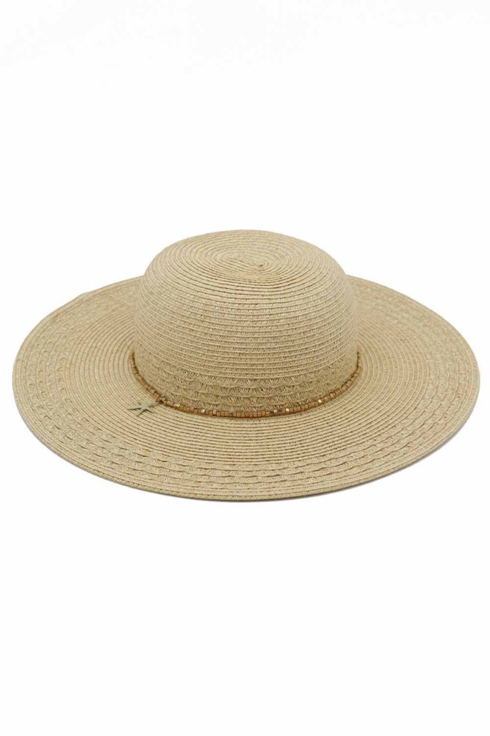 Natural Embrace summer style with this charming wide-brim straw sun hat, featuring a delicate starfish charm and beaded band detail. Crafted from a breathable blend of 80% paper and 20% polyester, it offers lightweight comfort for all-day wear. The generous brim provides excellent sun coverage, while UPF 50+ protection shields your skin from harmful rays. Perfect for beach days, outdoor adventures, or casual summer outings. A versatile accessory that combines fashion and function.