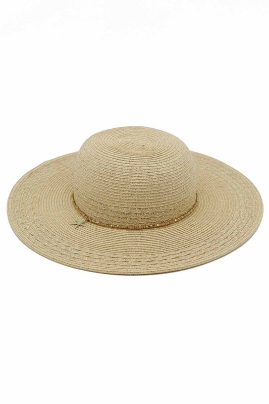 Natural Embrace summer style with this charming wide-brim straw sun hat, featuring a delicate starfish charm and beaded band detail. Crafted from a breathable blend of 80% paper and 20% polyester, it offers lightweight comfort for all-day wear. The generous brim provides excellent sun coverage, while UPF 50+ protection shields your skin from harmful rays. Perfect for beach days, outdoor adventures, or casual summer outings. A versatile accessory that combines fashion and function.