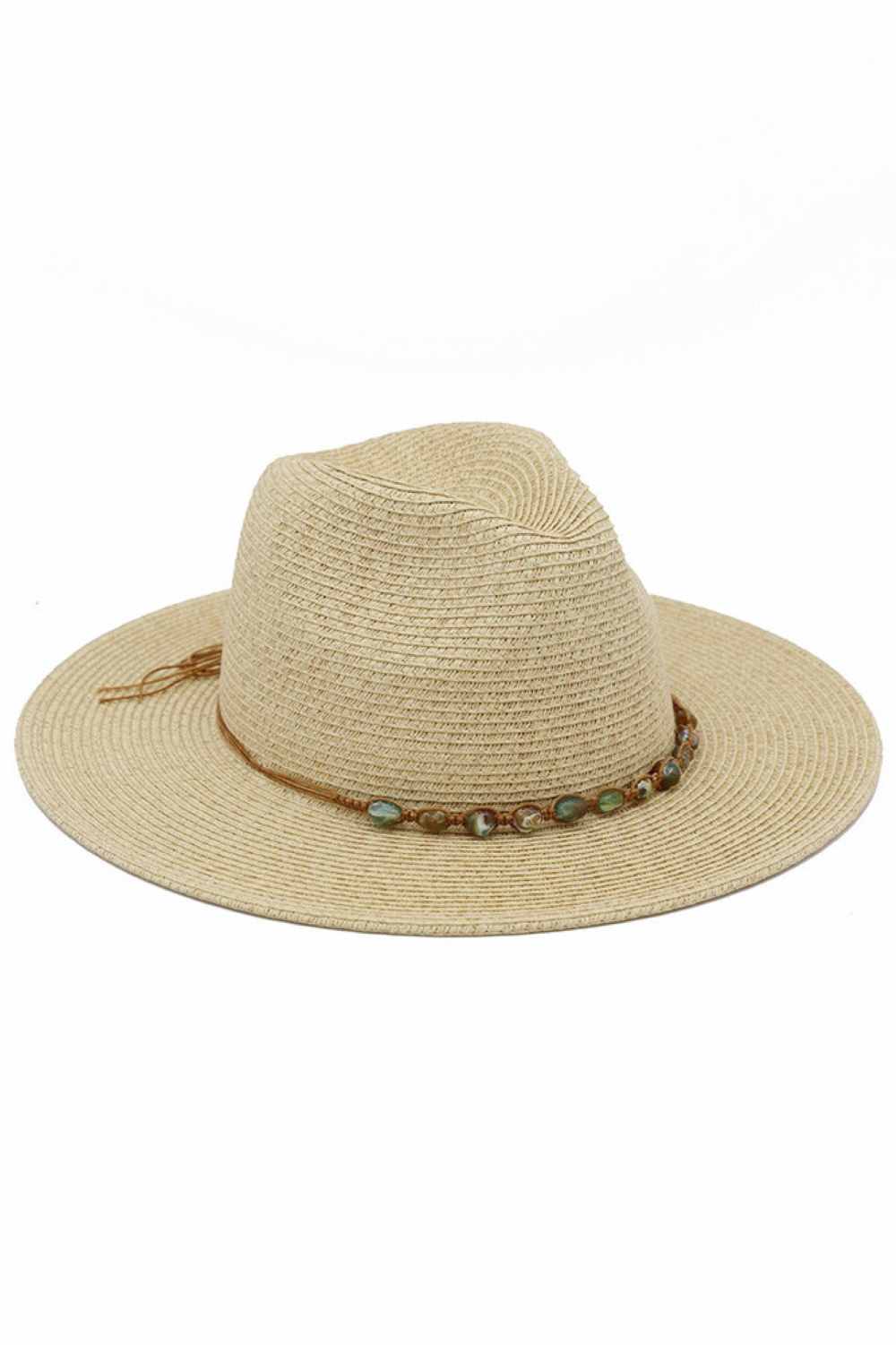 Natural Shield yourself from the sun in style with this summer straw fedora. Crafted from a breathable blend of 80% paper and 20% polyester, it offers lightweight comfort for warm-weather days. The turquoise stone band adds a vibrant pop of color to any outfit. With UPF 50+ protection, you'll stay safe from harmful rays while enjoying the outdoors. Perfect for beach trips, garden parties, or casual summer adventures.