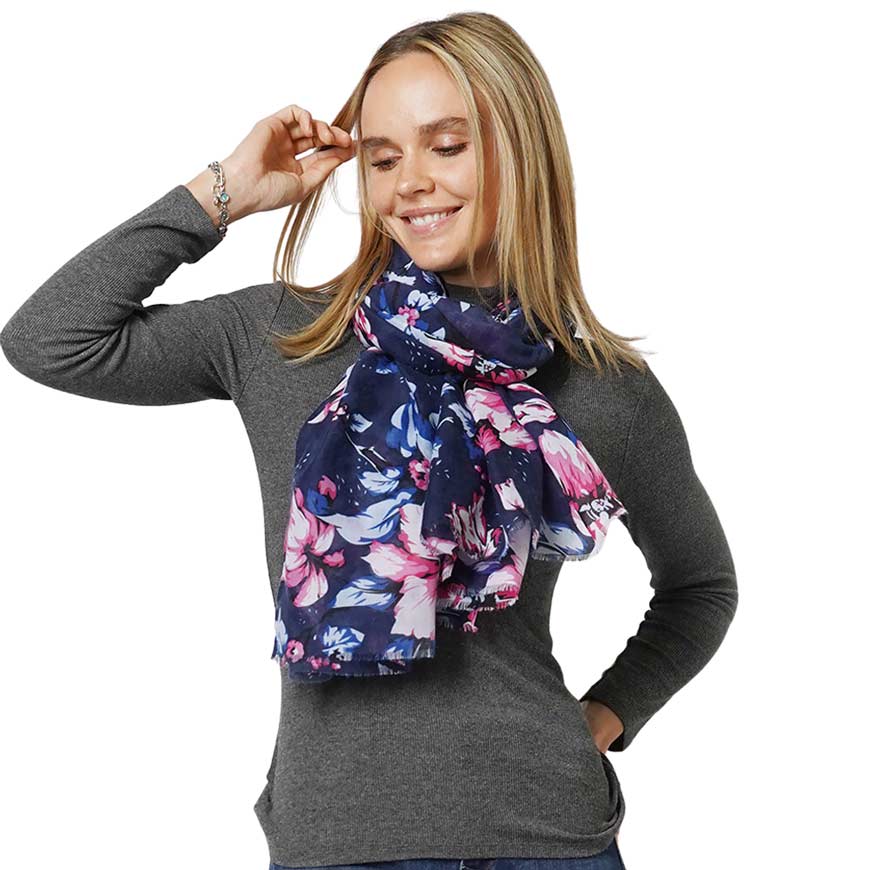 Navy Flower Printed Scarf, this timeless flower printed scarf is a soft, lightweight, and breathable fabric, close to the skin, and comfortable to wear. Sophisticated, flattering, and cozy. Perfect gift for birthdays, holidays, or fun nights out.