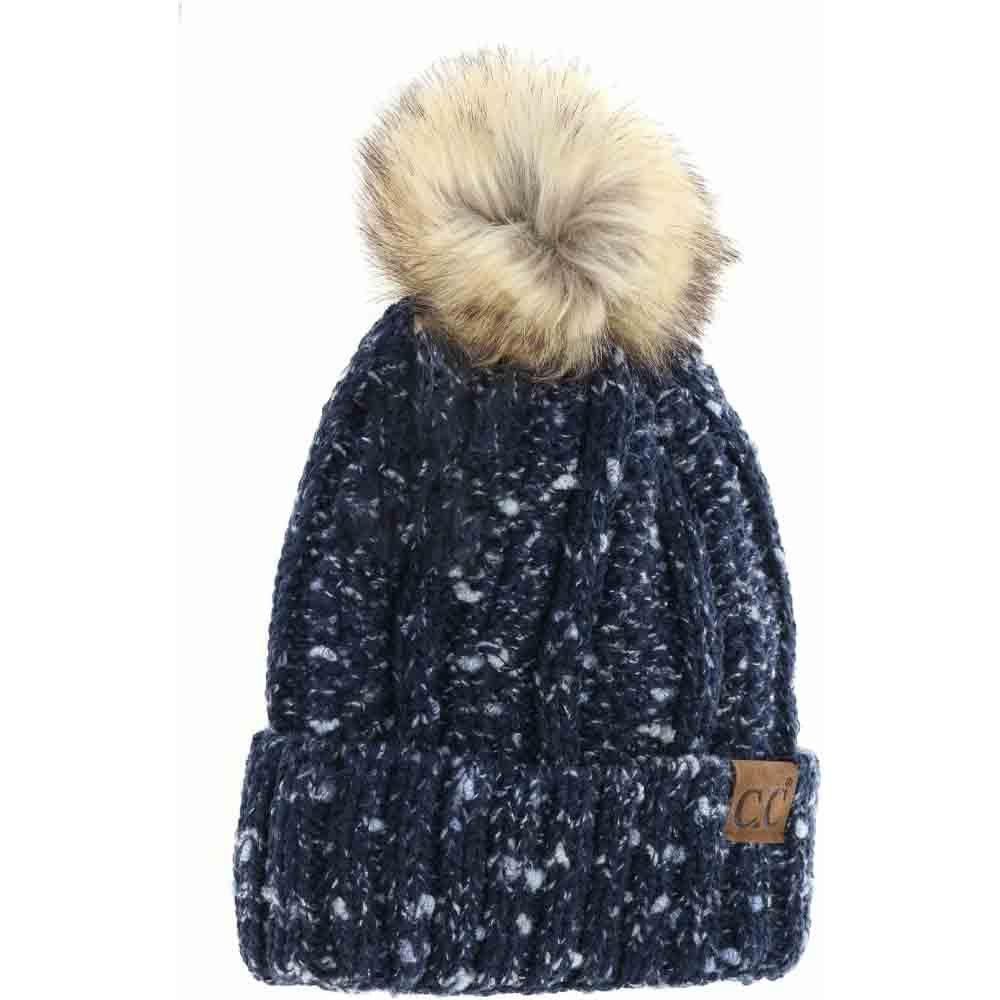 Navy Fuzzy Lined Confetti Knit Fur Pom CC Beanie combines functionality and style with its soft, confetti-speckled knit exterior and cozy fuzzy lining. Designed to provide superior warmth and comfort, this beanie features a plush fur pom for an added touch of elegance. Ideal for cold weather, its high-quality construction ensures durability and lasting wear, making it an essential accessory for those seeking expert-level performance and fashionable appeal in winter headwear. 