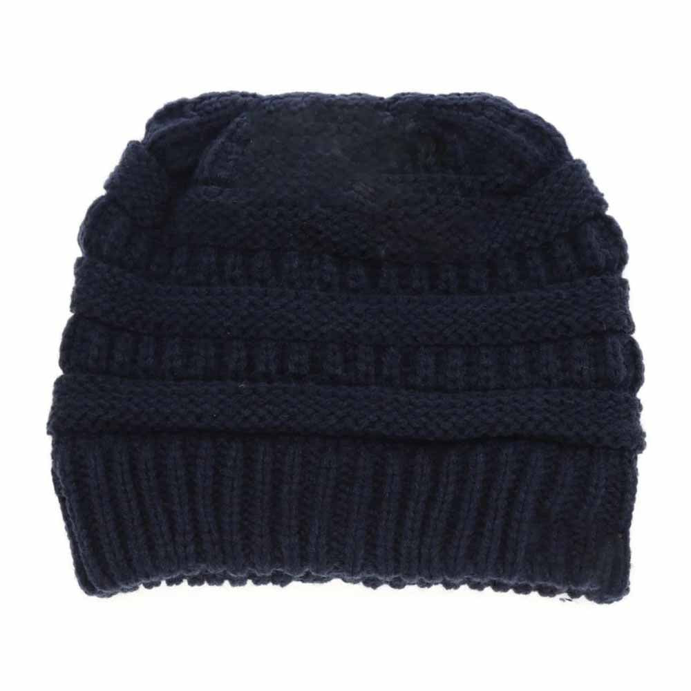 Navy Fuzzy Lined Solid Classic CC Beanie Tail offers expert warmth and comfort with its plush fuzzy lining, designed to retain heat during cold conditions. Its timeless solid color and classic silhouette make it a versatile addition to any winter wardrobe, while the distinctive tail detail adds a subtle, elevated style element. This beanie is ideal for those who demand both functionality and refined design in cold weather accessories. 