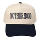 Navy MOTHERHOOD Message Embroidered Baseball Cap combines thoughtful design with quality craftsmanship. Featuring a clean, embroidered "MOTHERHOOD" message, it offers a subtle yet meaningful way to celebrate motherhood daily. The cap is made from durable materials to provide long-lasting wear, while its adjustable strap ensures a comfortable, personalized fit. Ideal for active moms seeking both style and function in a versatile accessory. 