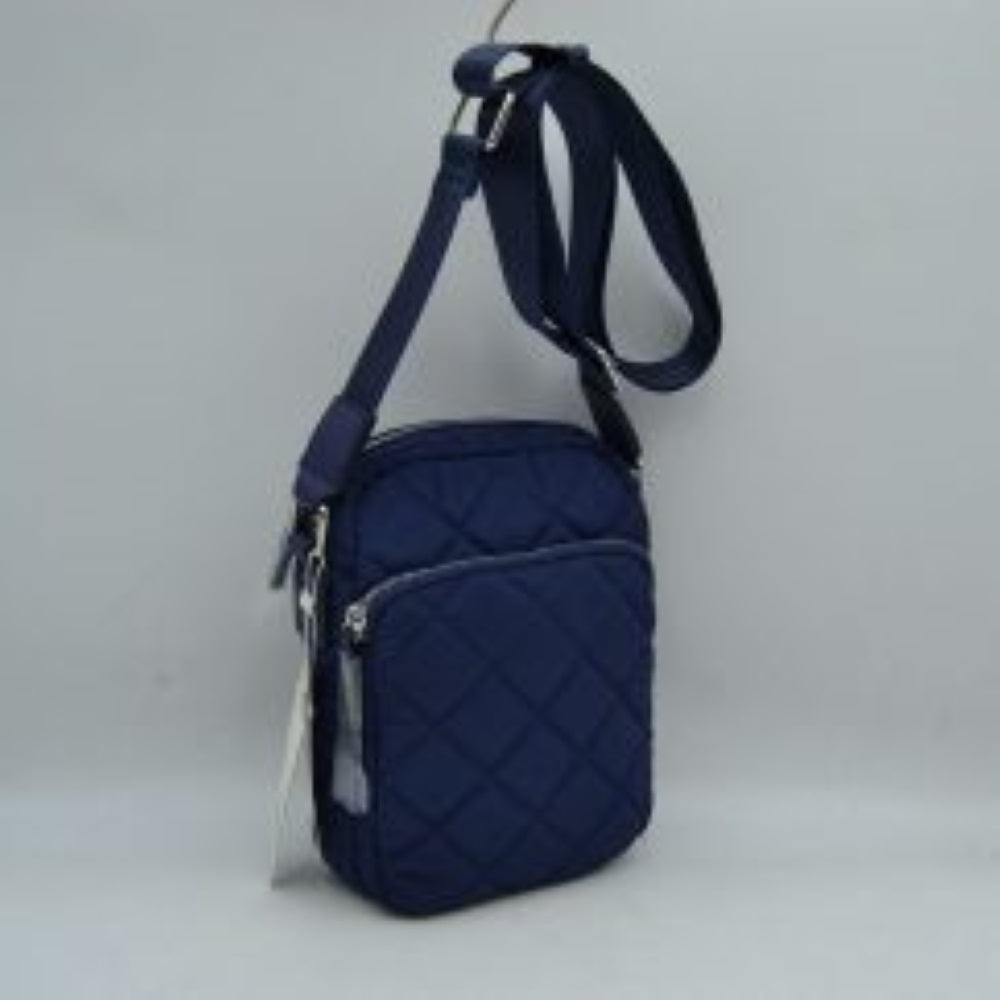 Navy-blue  This structural trapeze handbag showcases a clean exterior finish and distinct flared side panels, offering an elegant aesthetic for everyday use. It features unique rounded top handles shaped like segmented bamboo rings, which are attached securely via wide decorative tabs and metallic hardware on the front and back. A top zipper closure with an extended pull tab opens up to a secure main storage compartment, keeping all your essential items safe and neatly organized.