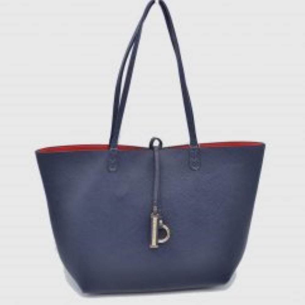 Navy-Blue This classic tote bag features a smooth exterior finish with a timeless trapeze silhouette, offering an elegant look for everyday use. Designed with an open top for quick access, the spacious main compartment provides ample storage space for daily essentials. Dual slim shoulder handles are securely stitched to the upper panels, while a decorative central drawstring tie accents the front, complete with a metallic ring and matching tab accent for a polished touch.