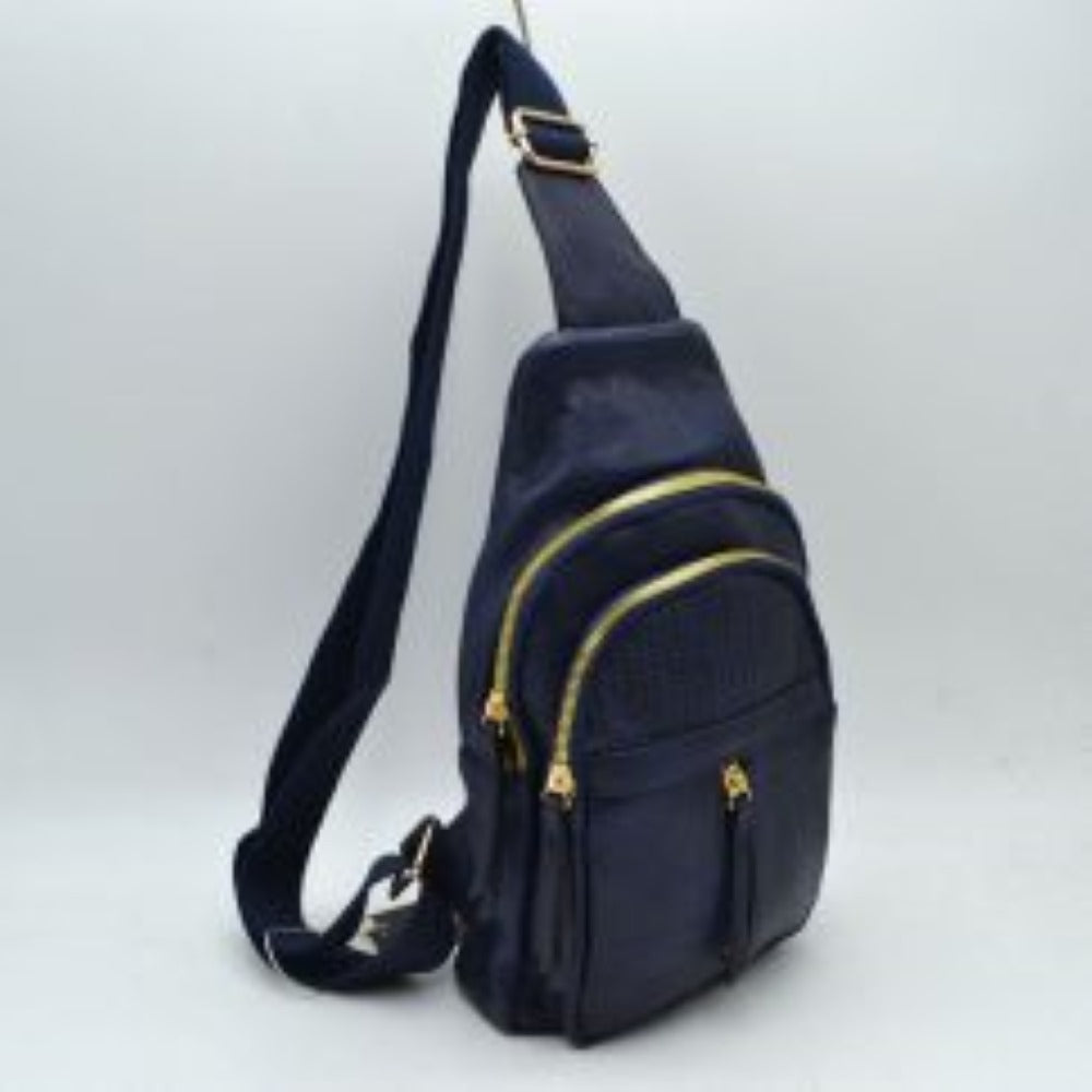 Navy-blue This functional sling bag features a textured, subtly grained exterior with an asymmetric silhouette ideal for active everyday use. It provides multiple organized storage compartments, including a spacious curved main section, an intermediate arched front pocket with a decorative perforated design, and a lower pouch featuring a vertical zipper closure and an elongated pull tab. The design is completed by a single wide