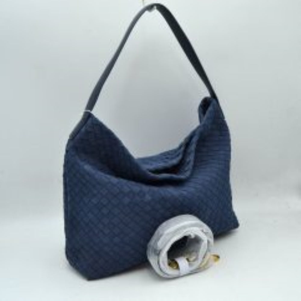 Navy blue This slouchy hobo bag showcases a textured woven pattern across its exterior, offering a refined look that is perfect for everyday use. The spacious main compartment provides ample storage for daily essentials, featuring a relaxed silhouette with a flat top shoulder strap for comfortable carrying. A separate, detachable secondary strap with metallic clasps is included, allowing for versatile styling options to suit your needs.