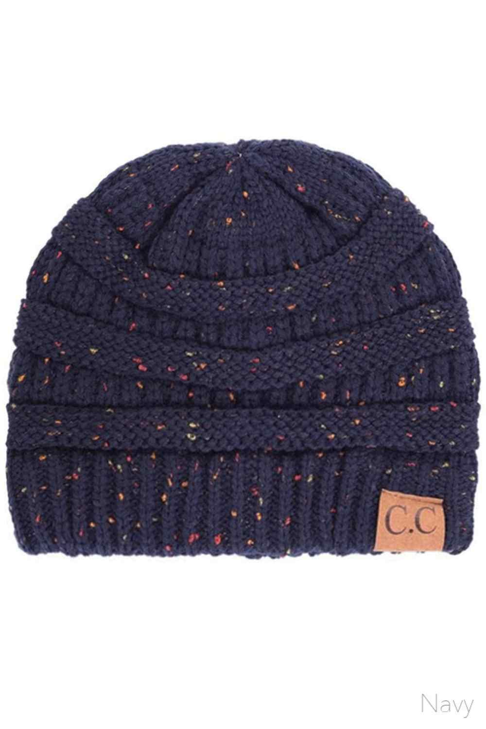 Navy Stay warm with timeless style in this C.C Confetti Cable Knit Beanie. Crafted from 100% soft acrylic, the classic cable knit texture provides excellent insulation while maintaining breathability for all-day comfort. The playful confetti detailing adds visual interest to this versatile essential. Lightweight yet durable, this beanie transitions seamlessly from casual outings to outdoor adventures, making it a reliable choice for any season.