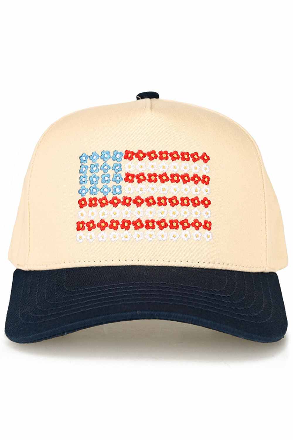 Navy C.C Daisy Flower Embroidered Pattern USA Flag Trucker Hat Baseball Cap features charming daisy embroidery paired with a patriotic USA flag design for a unique, eye-catching look. Designed in a classic trucker style, it offers lightweight comfort and an adjustable fit for everyday wear.
