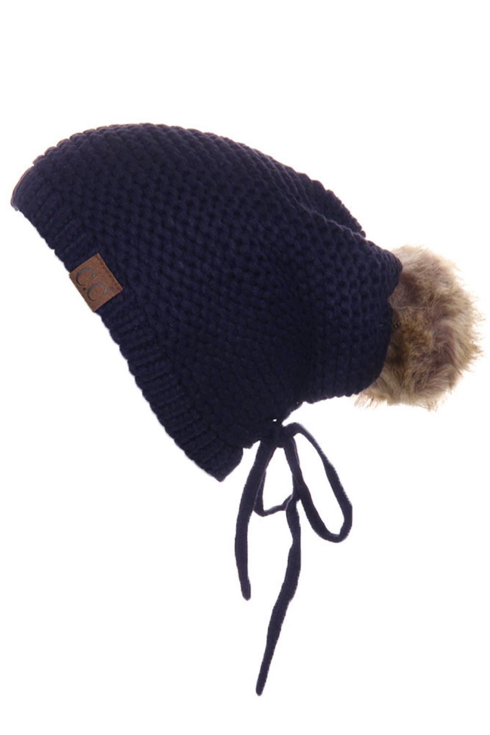 Navy Embrace effortless style with this C.C Adjustable Slouchy Beanie, complete with a cozy pom-pom on top. Made from 100% acrylic, it delivers warmth and comfort while maintaining a relaxed, on-trend silhouette. The slouchy fit works for everyone, making it a versatile addition to your cold-weather wardrobe.