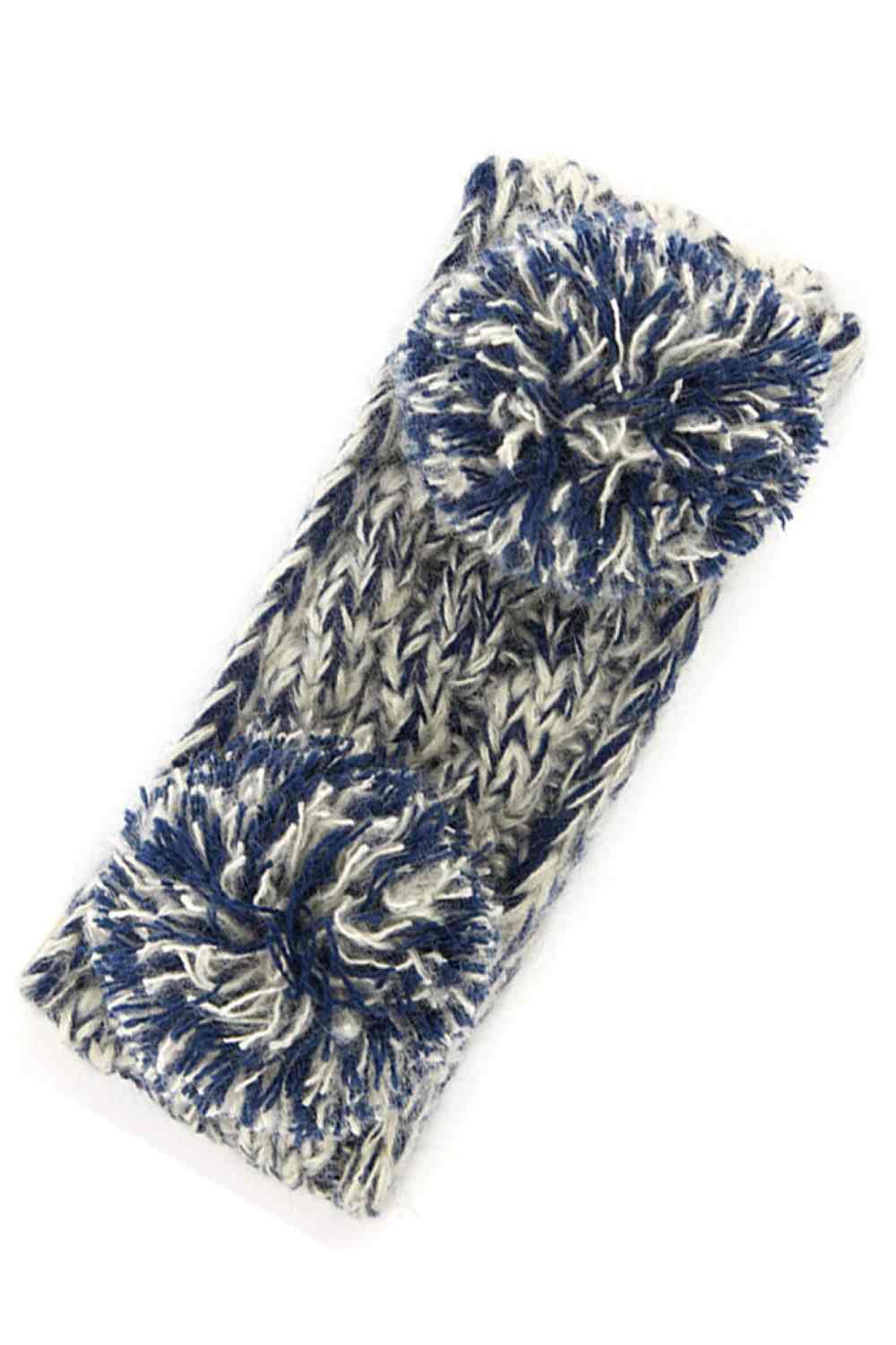 Navy Cozy two-tone kids head wrap featuring a soft fuzzy lining for extra warmth and comfort. Double pom-pom design adds playful style perfect for cold weather. Crafted from 100% acrylic for durability and easy care. One size fits most children. A practical accessory that keeps little ones warm while looking adorable.