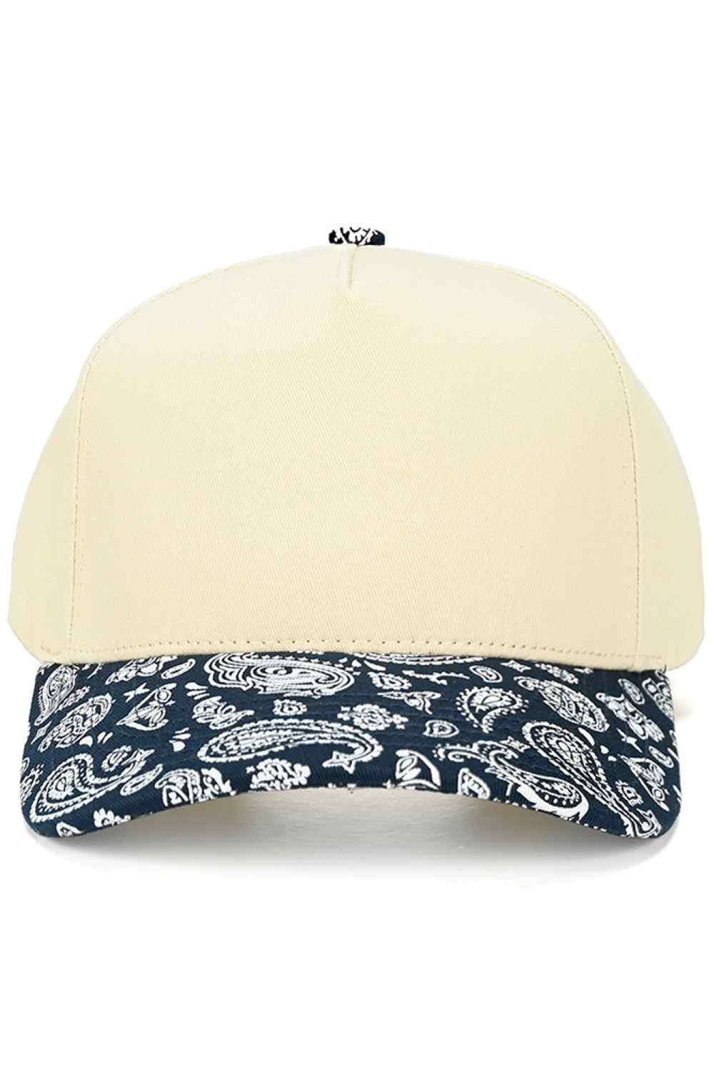 Navy Rock a timeless look with the C.C Paisley Pattern Two Tone Trucker Cap. This classic snapback combines breathable 100% cotton construction with a distinctive paisley design and contrasting two-tone colorway. The adjustable snapback closure ensures a comfortable fit for most head sizes, with a 22.5" circumference. Perfect for casual outings, outdoor activities, or everyday style, this versatile cap transitions seamlessly from day to night. Quality crafted in Vietnam, it's a wardrobe staple that compleme