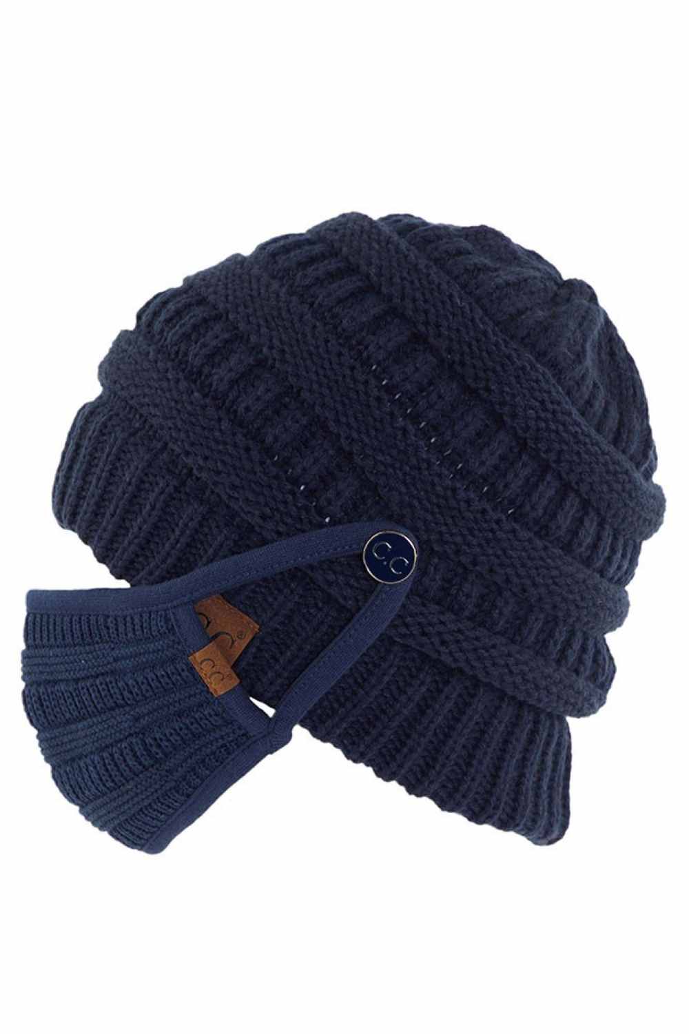 Navy Stay warm and functional with this C.C Ribbed Knit Beanie featuring a convenient button attachment for your mask. Crafted from 100% acrylic, this lightweight beanie offers soft comfort and durability for everyday wear.
