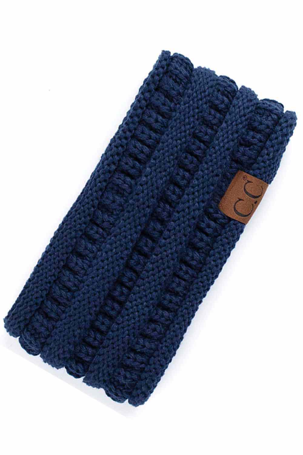 Navy Elevate your everyday style with the C.C Solid Ribbed Headwrap. Crafted from 100% acrylic, this versatile headwrap features a classic ribbed texture that adds dimension and visual interest. One size fits most, making it the perfect accessory for any occasion—whether you're running errands, hitting the gym, or making a fashion statement. Made in Korea with quality craftsmanship you can trust. Comfortable, durable, and effortlessly chic.
