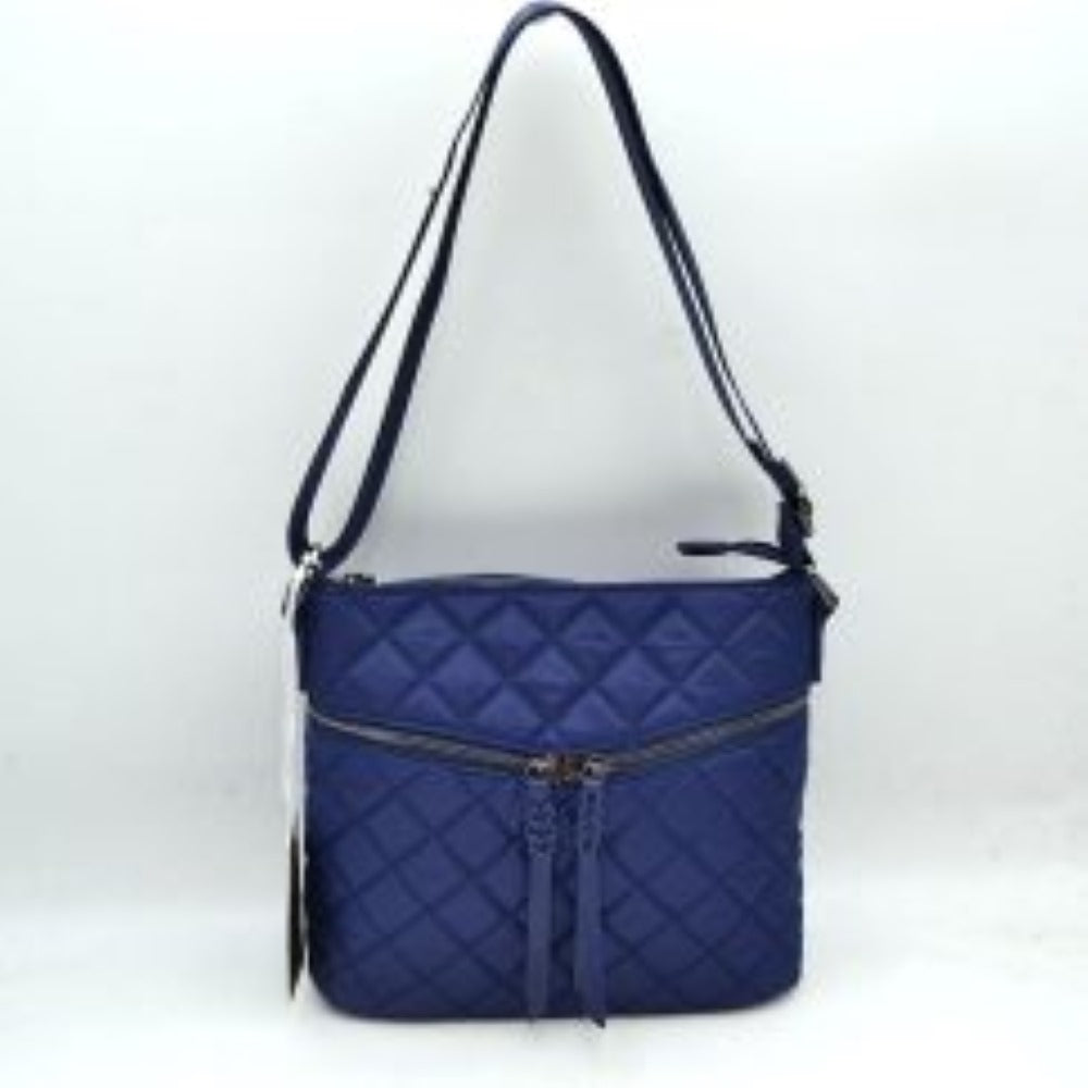 Navy This casual crossbody bag features a classic diamond quilted design and a slim, flexible profile tailored for everyday use. It offers multiple functional storage compartments, including a main upper zippered area and a distinct, gently curved horizontal front pocket equipped with dual center-closing zipper pulls that feature long, matching fringe extensions. A long, integrated adjustable shoulder strap ensures comfortable carrying over the shoulder or across the body.