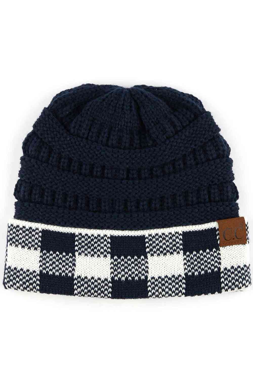 Navy White Upgrade your cold-weather style with the C.C Buffalo Check Cuff Knit Beanie. This classic beanie features a distinctive buffalo check pattern cuff that brings timeless appeal to any winter look.