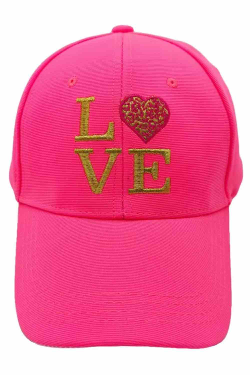 Neon Pink Add a sweet, stylish touch to your look with this LOVE heart baseball cap, featuring a charming heart design on the front and a classic curved brim. Made for everyday comfort with an adjustable fit, it’s perfect for casual outings, sunny days, and spreading good vibes wherever you go.