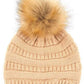 New Beige Stay warm and cozy with this classic C.C Pom Pom Knit Beanie, crafted from 100% soft acrylic for all-day comfort. The ribbed knit design adds texture and durability, while the signature pom pom on top brings a playful touch to any winter outfit. One size fits most, making it the perfect accessory for everyone. Ideal for cold weather adventures or casual everyday wear.