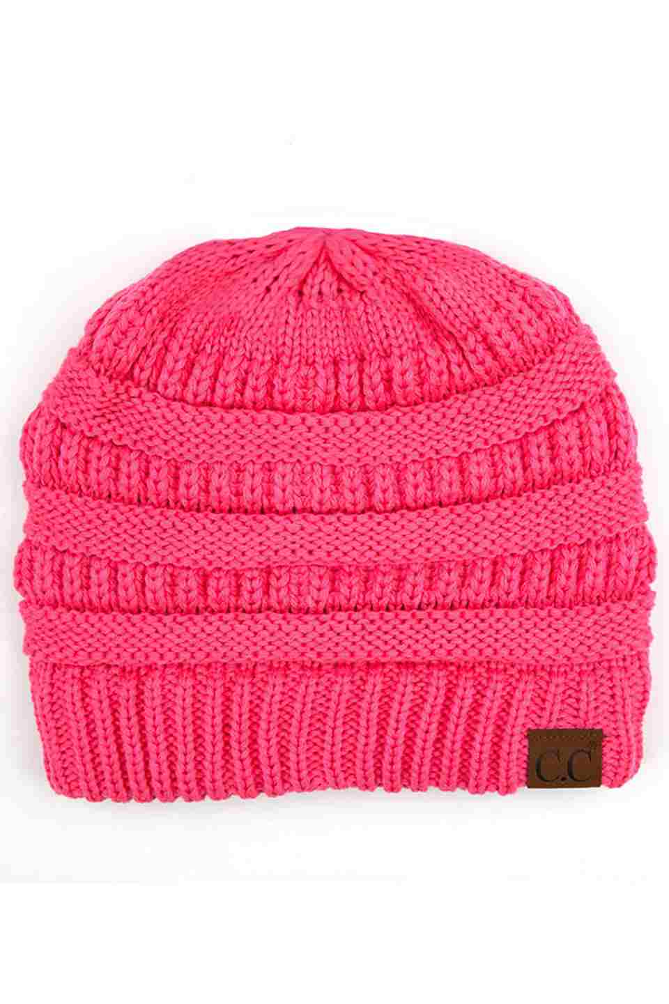 NewCandyPink  C.C Ribbed Knit Solid Color Beanie offers a timeless design with durable ribbed knitting, ensuring a snug and comfortable fit. Crafted for warmth and versatility, this beanie is perfect for everyday wear, providing reliable protection against cold weather while maintaining a sleek, minimalist style that complements any outfit. Its solid color adds understated appeal, making it an essential accessory for both casual and outdoor use. 