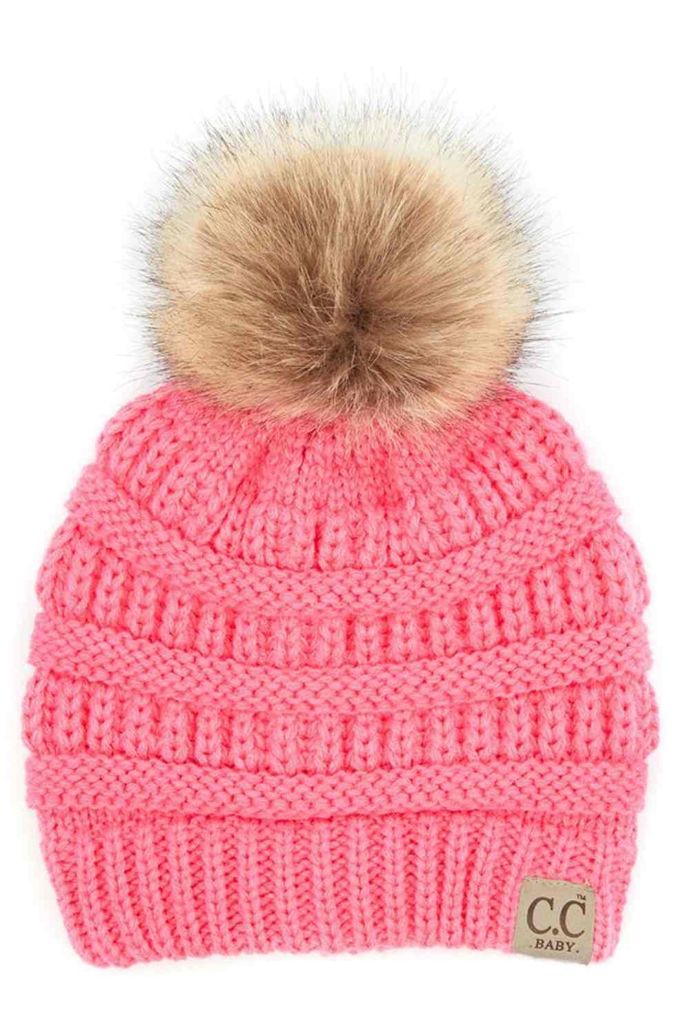 New Candy Pink Keep your little one warm and cozy with this C.C Solid Ribbed Infant Beanie. Made from 100% acrylic, the soft ribbed knit construction provides gentle comfort against delicate skin while the natural fur pom adds a charming detail.