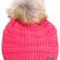 New Candy Pink Stay warm and cozy with this classic C.C Pom Pom Knit Beanie, crafted from 100% soft acrylic for all-day comfort. The ribbed knit design adds texture and durability, while the signature pom pom on top brings a playful touch to any winter outfit. One size fits most, making it the perfect accessory for everyone. Ideal for cold weather adventures or casual everyday wear.