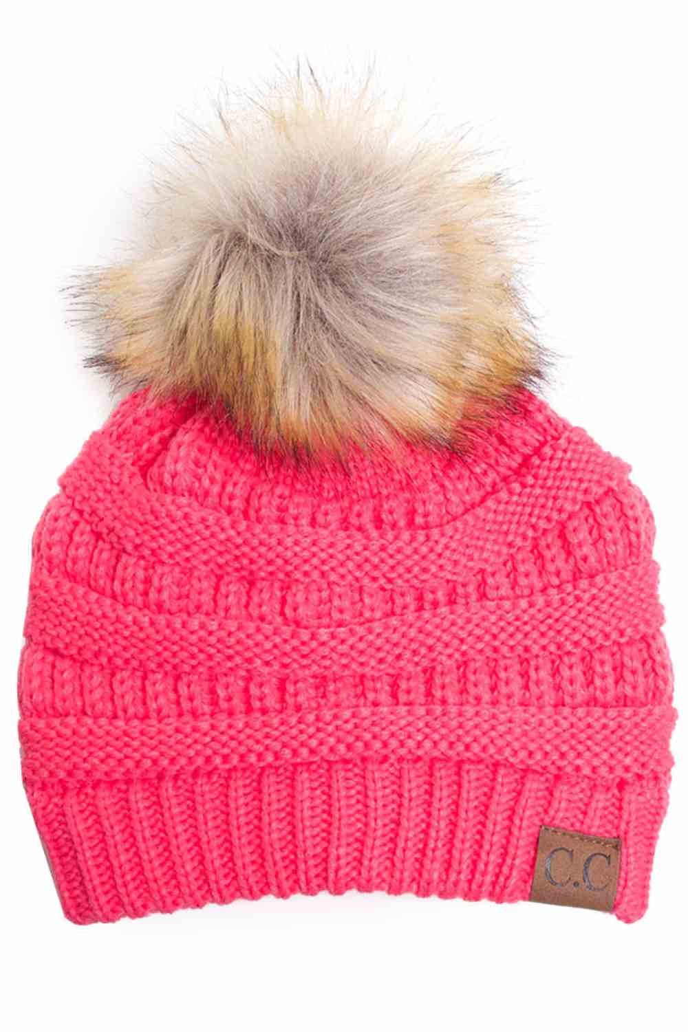 New Candy Pink Stay warm and cozy with this classic C.C Pom Pom Knit Beanie, crafted from 100% soft acrylic for all-day comfort. The ribbed knit design adds texture and durability, while the signature pom pom on top brings a playful touch to any winter outfit. One size fits most, making it the perfect accessory for everyone. Ideal for cold weather adventures or casual everyday wear.