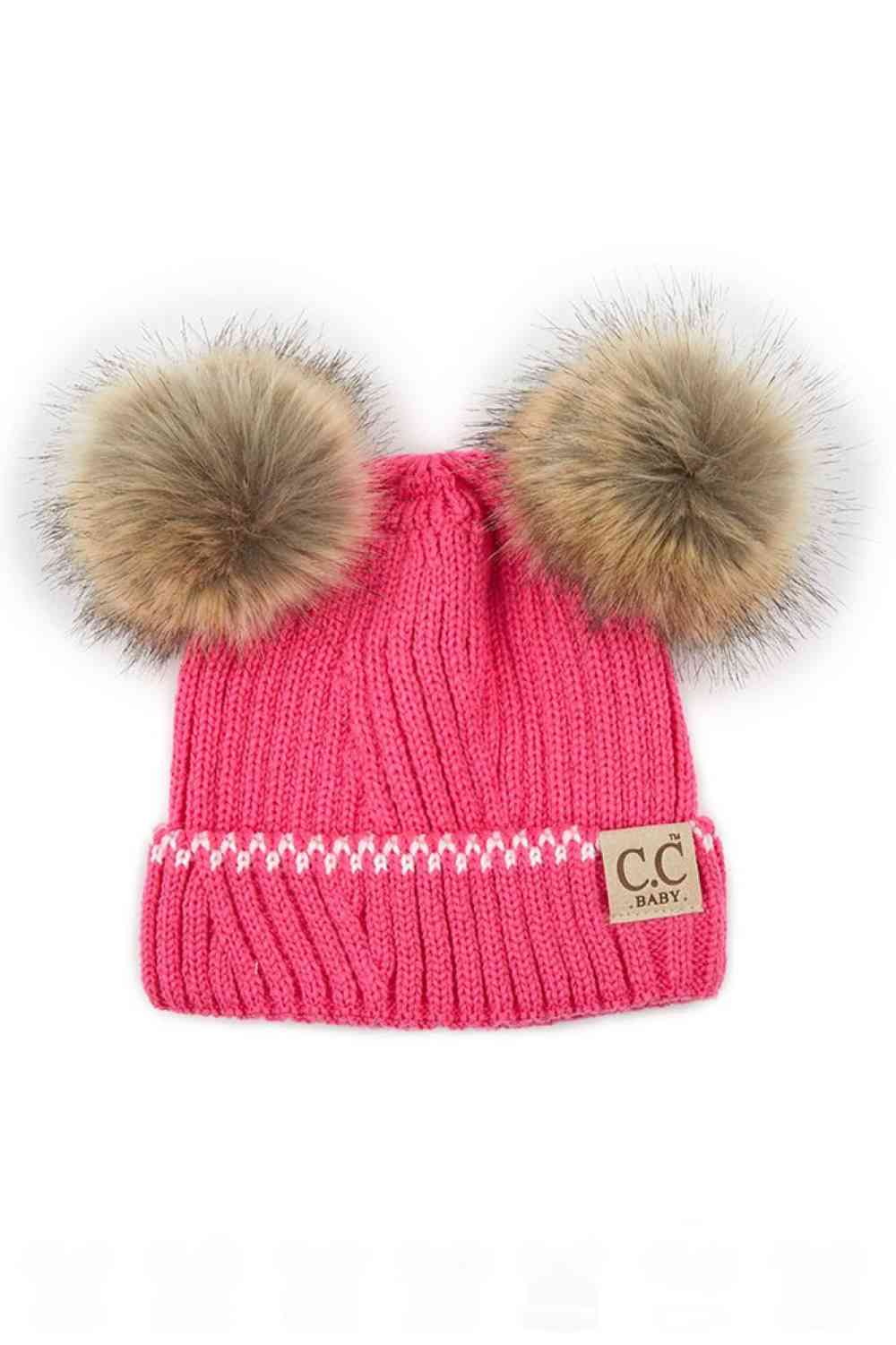 New Candy Pink Wrap your infant in warmth and style with this C.C Solid Knit Double Pom Beanie. Crafted from 100% acrylic, this soft and durable beanie features a classic ribbed knit construction paired with two adorable poms for extra charm. Perfect for keeping tiny heads cozy during cold weather while adding a playful touch to any outfit.