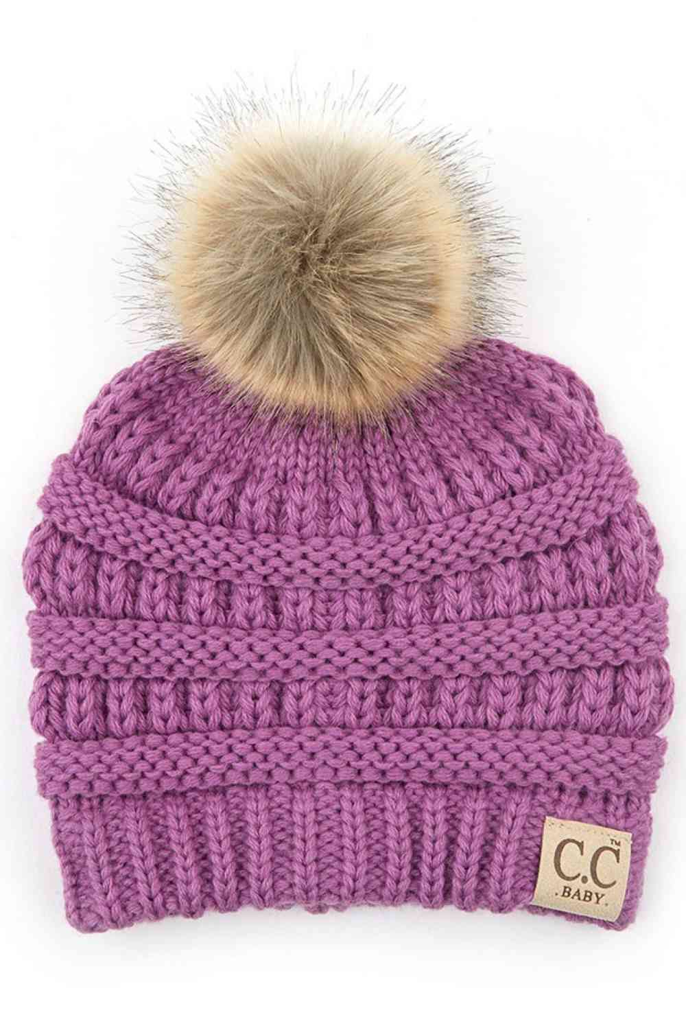 New Lavender Keep your little one warm and cozy with this C.C Solid Ribbed Infant Beanie. Made from 100% acrylic, the soft ribbed knit construction provides gentle comfort against delicate skin while the natural fur pom adds a charming detail.