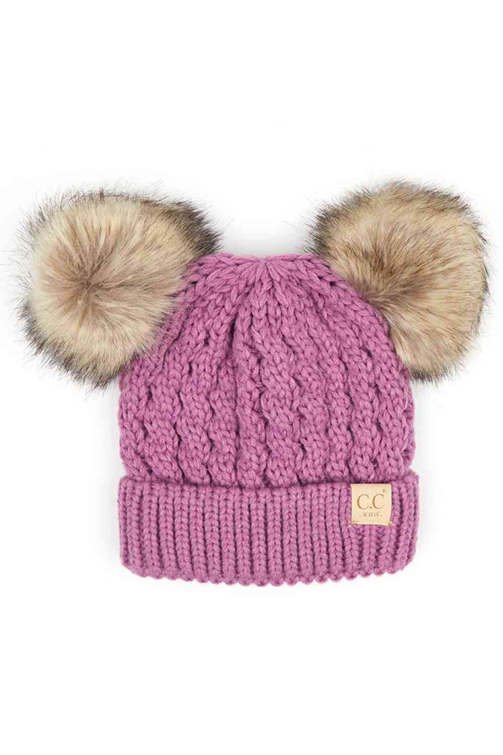 New Lavender Keep your child warm and stylish with this C.C Kids Double Pom Pom Beanie. Featuring an all-over cable knit pattern and dual pom poms for extra charm, it's the perfect accessory for chilly days.